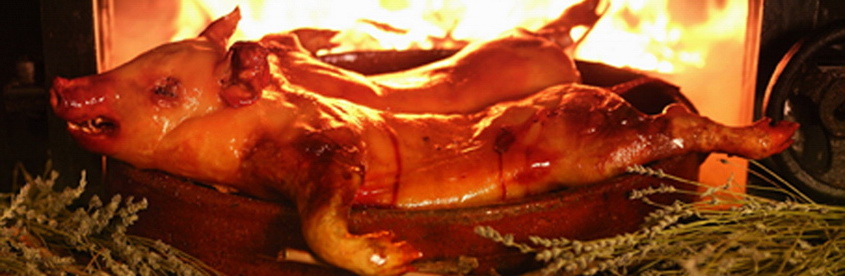 Cochinillo de Segovia asado a la leña